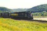 Paused manifest waits in the siding for a meet